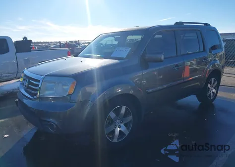 2012 Honda Pilot Touring z USA, uszkodzony, nr VIN 5FNYF3H95CB041879